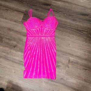 Pink Windsor, mini dress with rhinestones all over it in a size medium